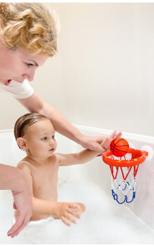 Marppy Bath Toy Basketball Hoop – child enjoying bath time shooting balls into hoop